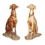 Bronze patinated wood pair of statues