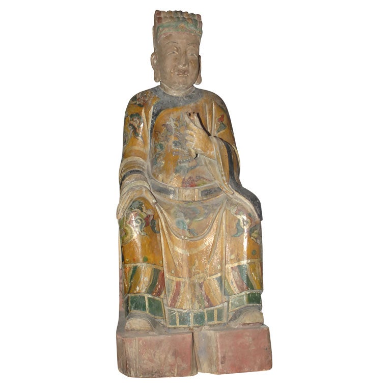 A Qing Dynasty Painted and Carved Wood Deity Figure For Sale
