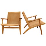 A Handsome pair of Hans Wegner CH25 oak armchairs