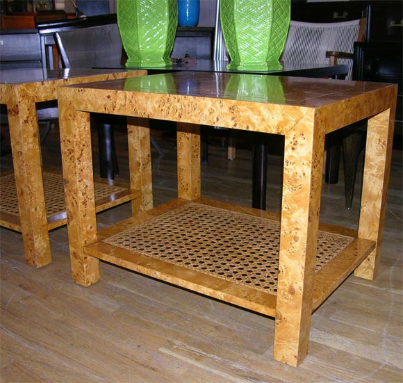 Pair of Burlwood end tables with cane bottom shelf by John Stuart