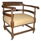 Eastlake style walnut arm chair
