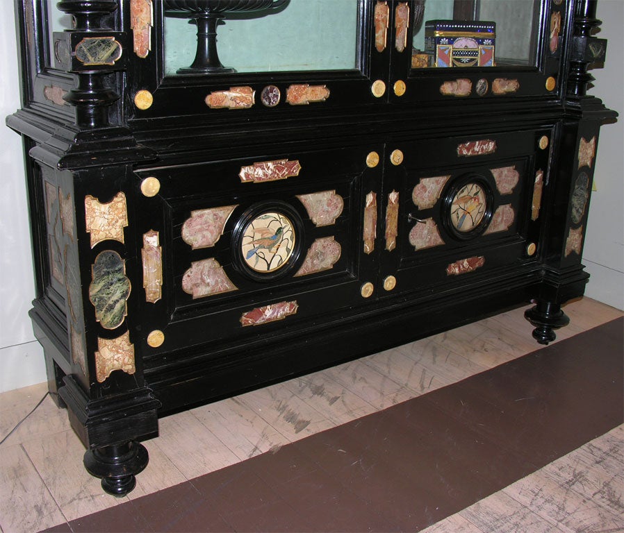 A Baroque Style Marble-Inset Ebonized Cabinet
