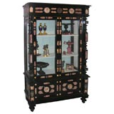 A Baroque Style Marble-Inset Ebonized Cabinet