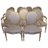 A Set of Twelve Georgian Giltwood Dining Chairs