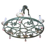 whimsical iron chandelier with handpainted porcelain cups