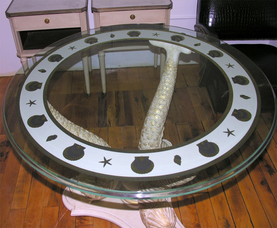 Pair of small round gueridons style round tables on dolphin base 1