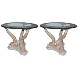 Pair of small round gueridons style round tables on dolphin base