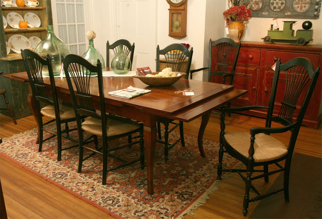 We are happy to offer this wonderful reproduction France wheatback chair. It is made from beechwood, either painted or stained and done with a wide rush seat. It also available in an armchair. The price is for the side chair. the arm chair is $650