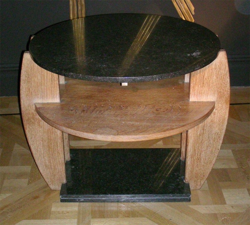 An Art Deco Oak and Black Belgian Fossil Gueridon table