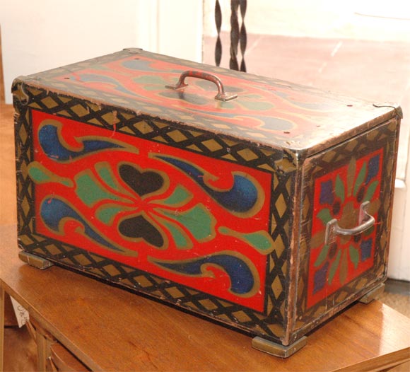 A disappearing miniature box that is placed inside the larger magic box. With a slight manipulation of the top handle, the smaller box disappears into a trick drawer!