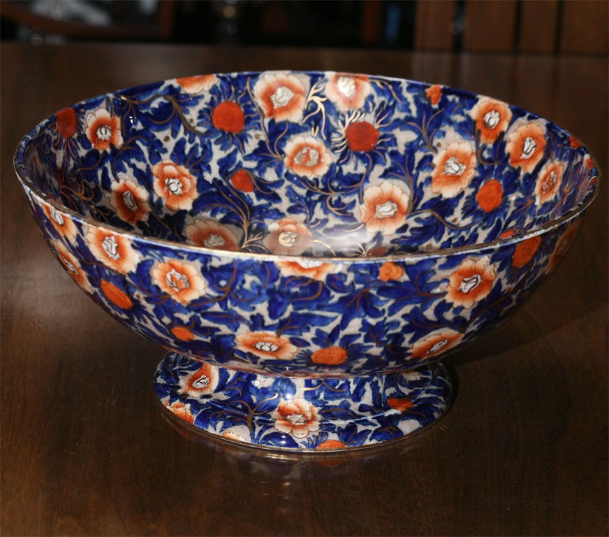 Wonderful footed punchbowl or centerpiece with all-over hand painted decoration in the 