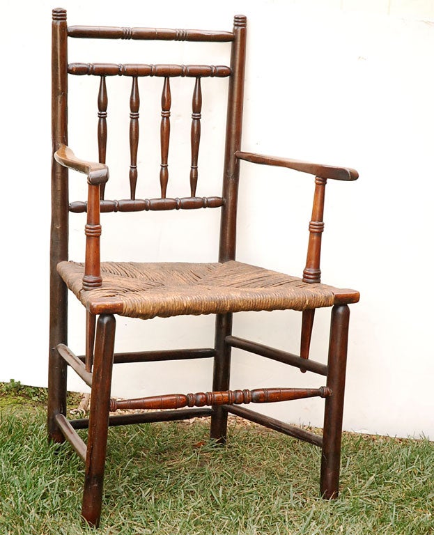 Antique rush seat armchair