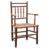 Antique rush seat armchair