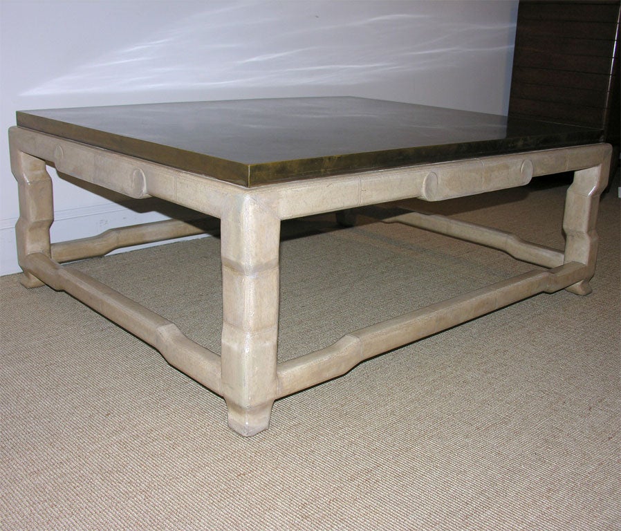 A Maitland Smith Leather and Fossil Stone Low Table.
