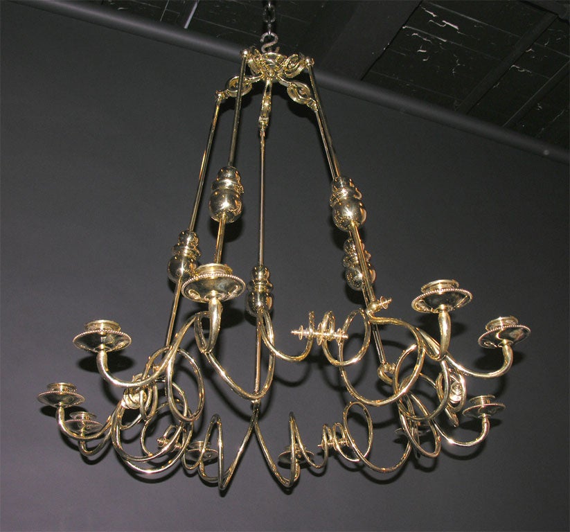 Polished brass swirl ten-light counterweight chandelier
