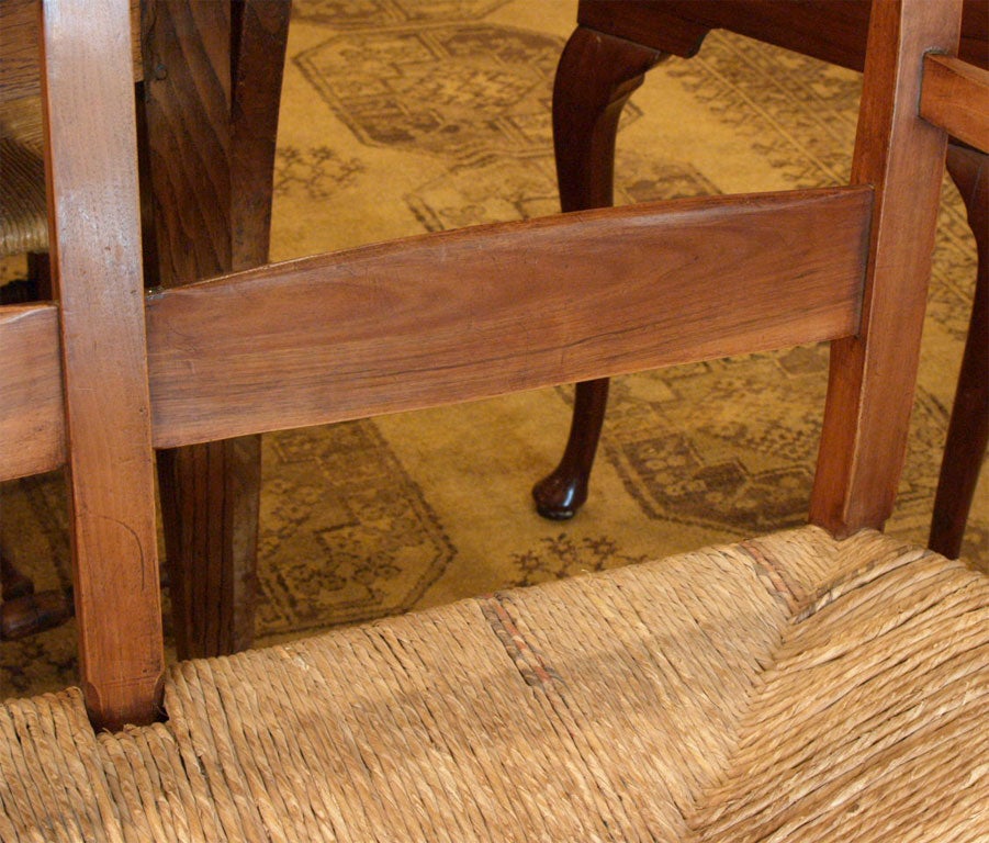 Antique French provincial rush seat fruitwood bench. 1