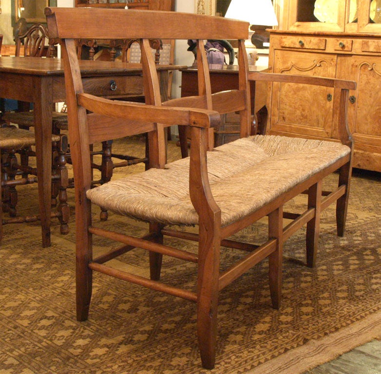 Antique French provincial rush seat fruitwood bench. 4