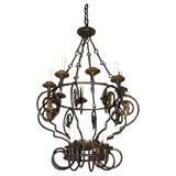 Forged iron twelve light chandleier with bird motif. Forged iron twelve light chandleier with bird motif.