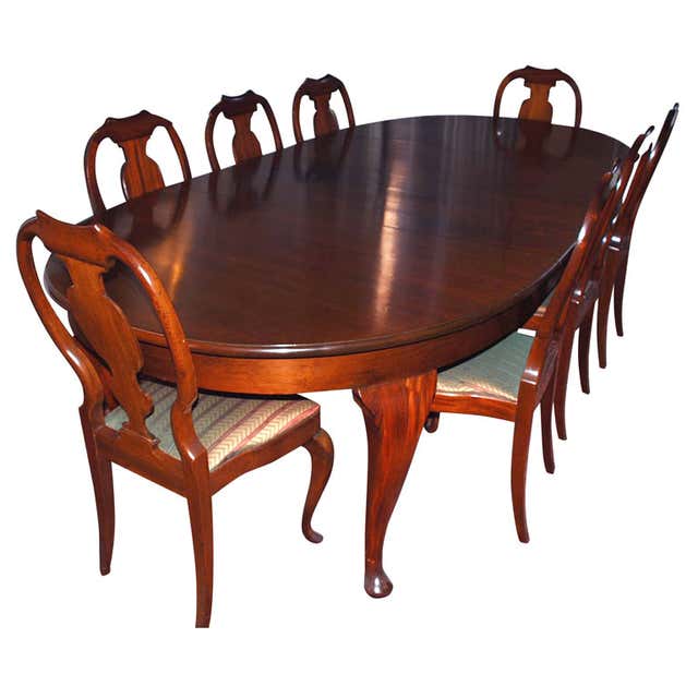A Northern European Mahogany Dining Room Table with 12 Chairs at ...
