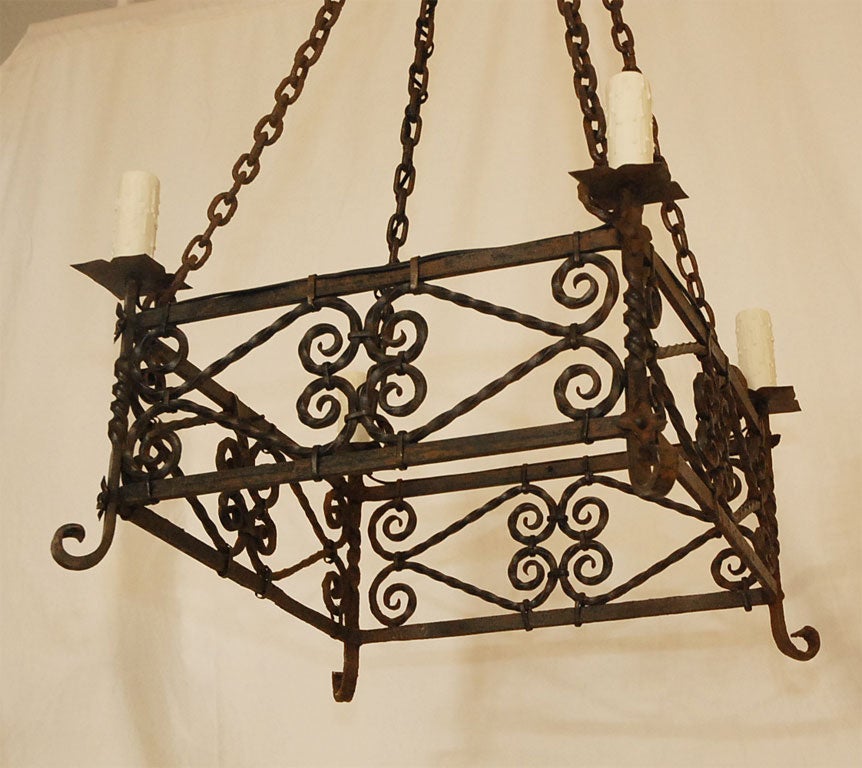 Late 19th Century Spanish Wrought Iron 4-Lite Chandelier (height given includes canopy/link)
(Showroom Closing/Liquidation, Now on final sale for 800.00, reduced from 5,400.00)