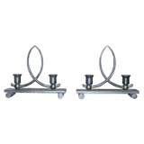 pair of candle holders by Charles Piguet