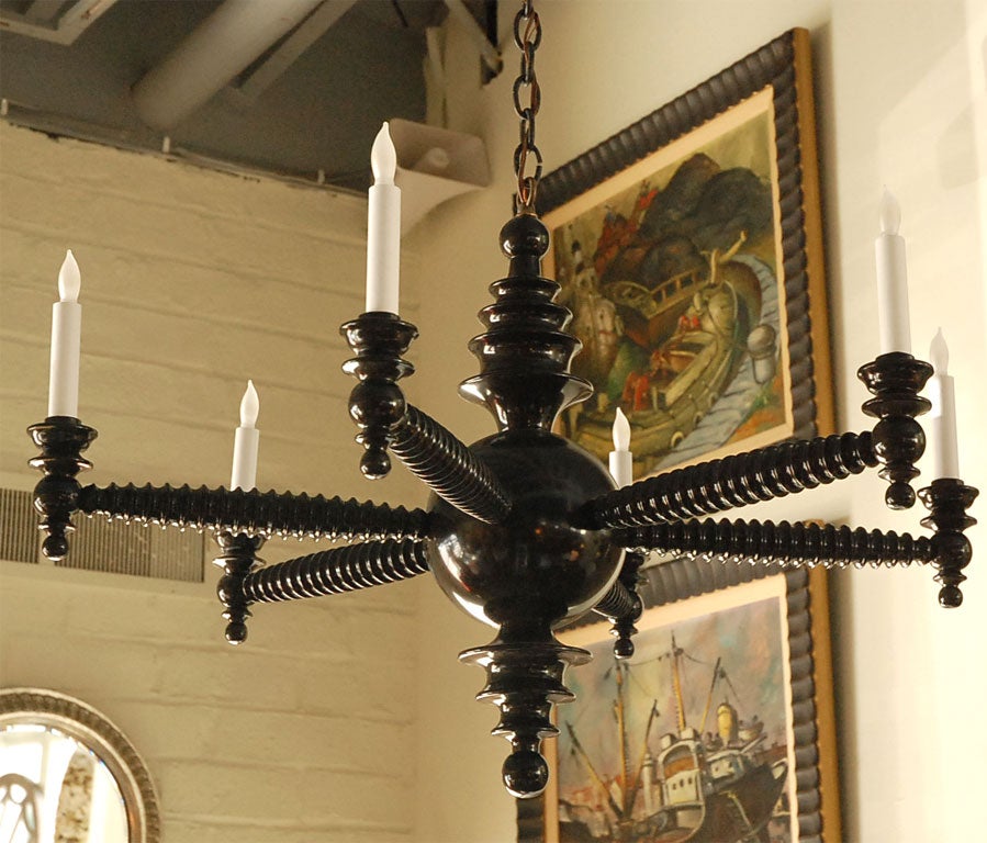 Paul Marra Design Spool Chandelier shown in ebony finish and 36 inch diameter. Available to order, or in other sizes (inquire for lead time).  Price quoted is for this size. By order.