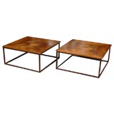Pair of contemporary inlaid coffee tables with iron bases