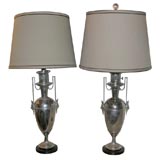 A pair of Neo Classical silver plated lamp