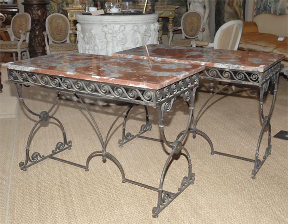 Art Deco iron and marble top pair of console tables