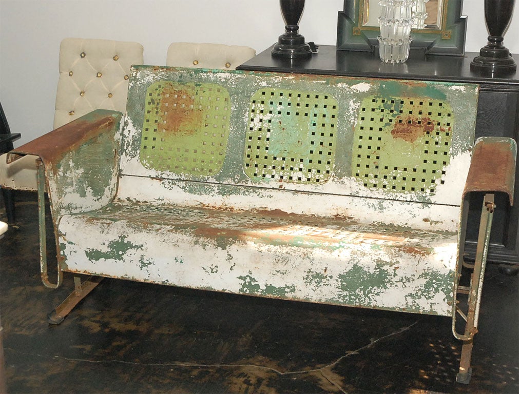 Swinging painted metal bench. Cool industrial look. Very comfortable. Great for a loft, hallway, entrance.