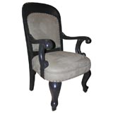 Ebonized  American armchair with suede upholstery