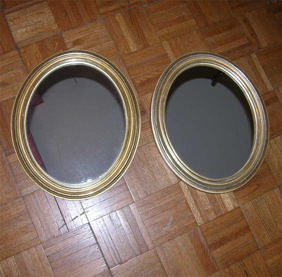 Pair of 19th Century Oval Giltwood Mirrors