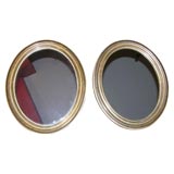 Pair of 19th Century Oval Giltwood Mirrors