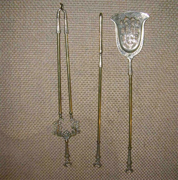 Set of brass firetools