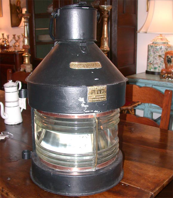 A Large Masthead Navigation Ship Lantern with Brass Trim. Interior Kerosene Wick is Missing.