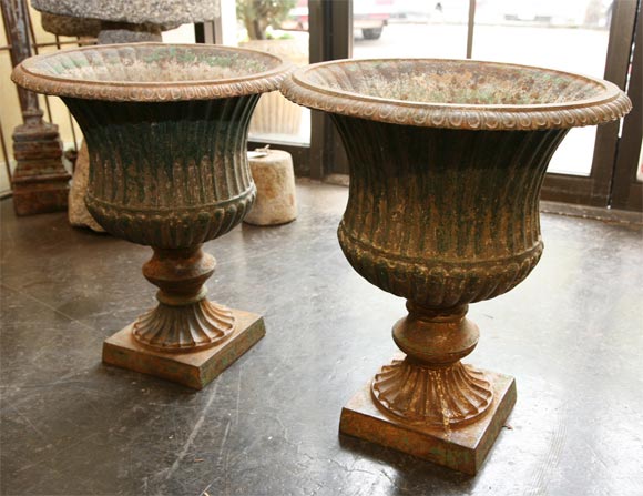 
Fine cast iron Regency urns with particularly nice patina. 