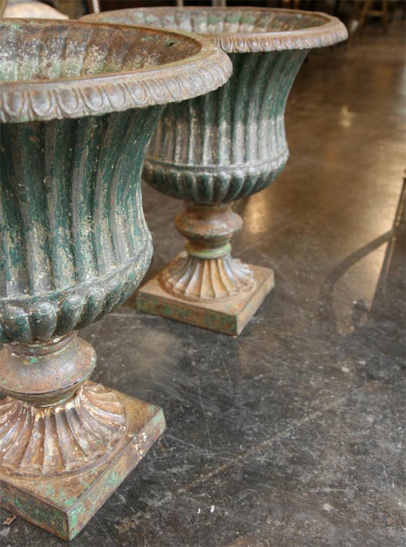 Iron Pair of Regency  cast  iron urns For Sale