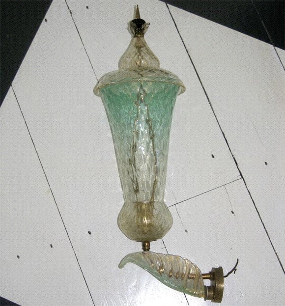 Spectacular Venetian clear glass infused with gold and aqua colored glass lantern with deep red and gold glass finial.