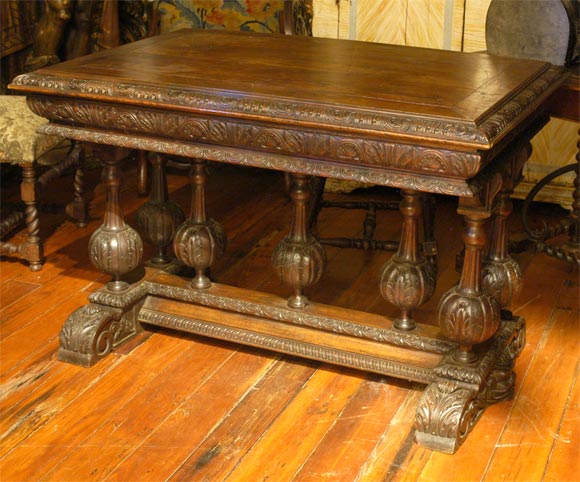 Wonderful table with gallery base in walnut.