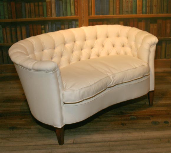 tufted kidney shaped settee