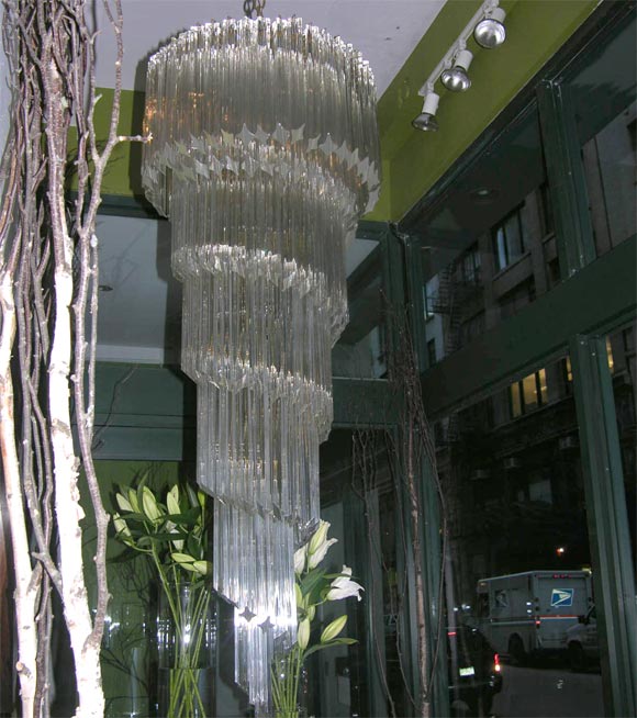 Impressive chandelier with 155 individually hung Murano glass bars.