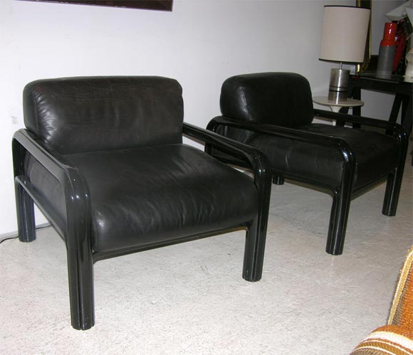 Pair of Gae Aulenti lounge chairs for Knoll in black enameled steel frames and black leather upholstery.  Knoll label.