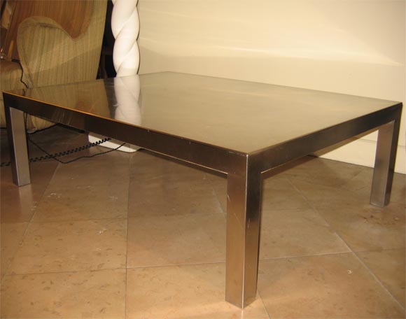 1972 table by Maria Pergay in stainless metal, with four square legs.