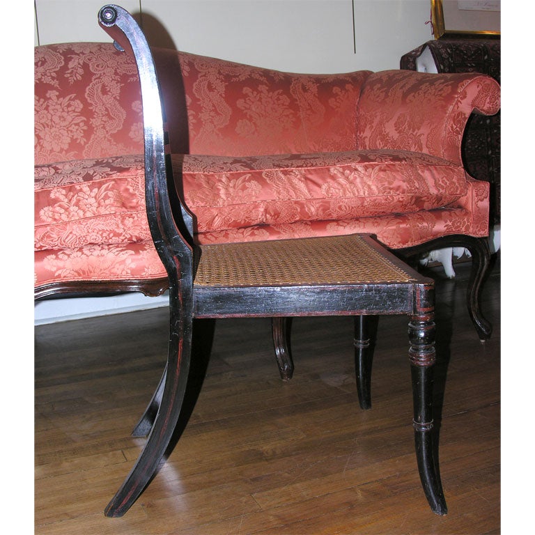 Pair of Regency black lacquered and painted side chairs 1