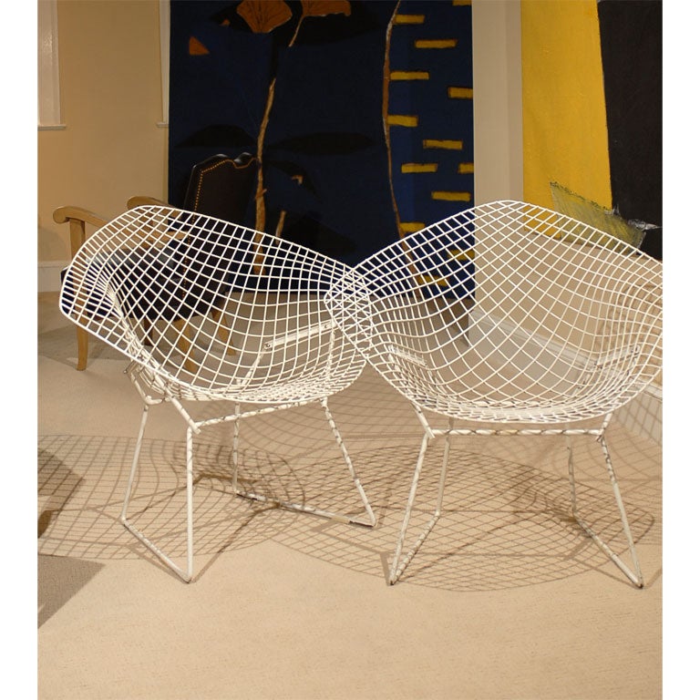 A pair of Harry Bertoia diamond chairs