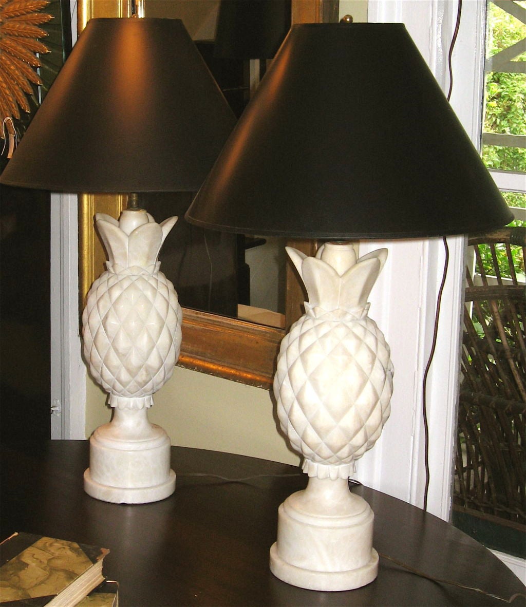 Pair of carved white alabaster pinapple lamps.