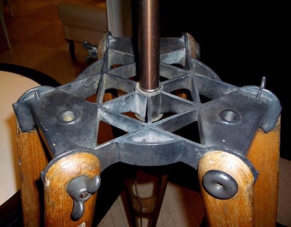 Surveyor's tripod newly made into a standing lamp.
