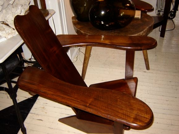 Pair of handmade Westport style Adirondack chairs from Maine. Unusual highly polished wood finish. Very modern, but very comfortable!