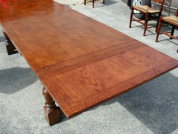 Rectangular top, joined base dining table with 2-18 inch leaves. Also available in custom sizes.
