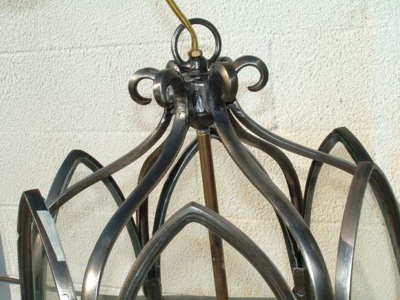 Two-tier 12 light electrified iron chandelier.